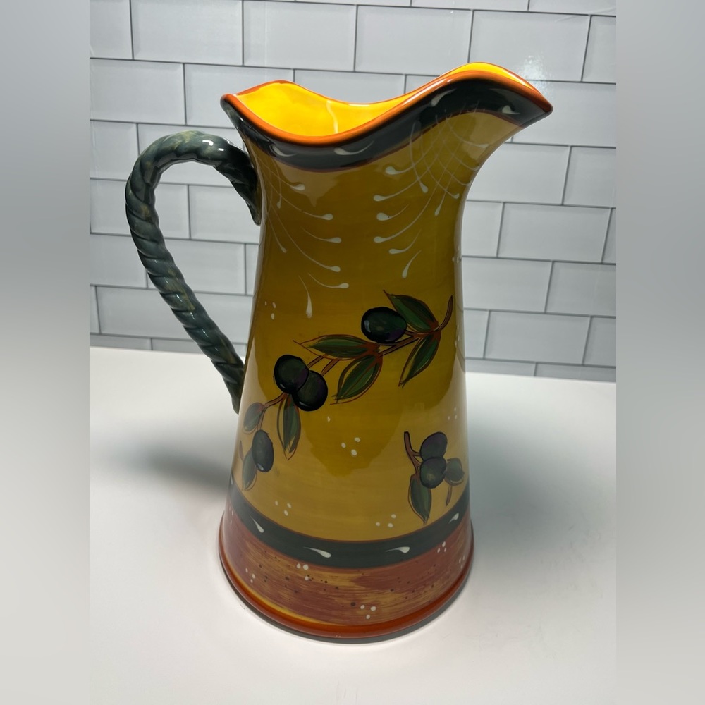 Certified international discontinued French olives pattern pitcher great cond.